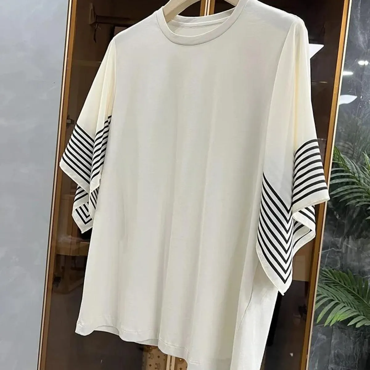 Camicetta da donna alla moda 2023 T-shirt in cotone con maniche a righe a foglia di loto Top camicie da donna